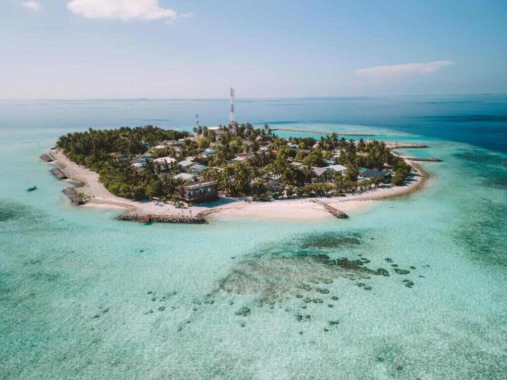 Rakeedhoo island surrounded by the reef of Vaavu Atoll